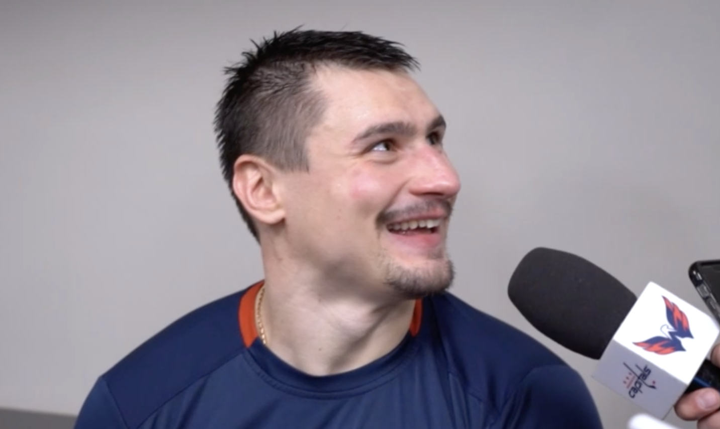 Dmitry Orlov takes questions from the media following a 2022 game.